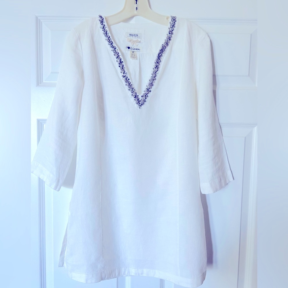 100% Linen tunic with beautiful rhinestone & sequin detail.